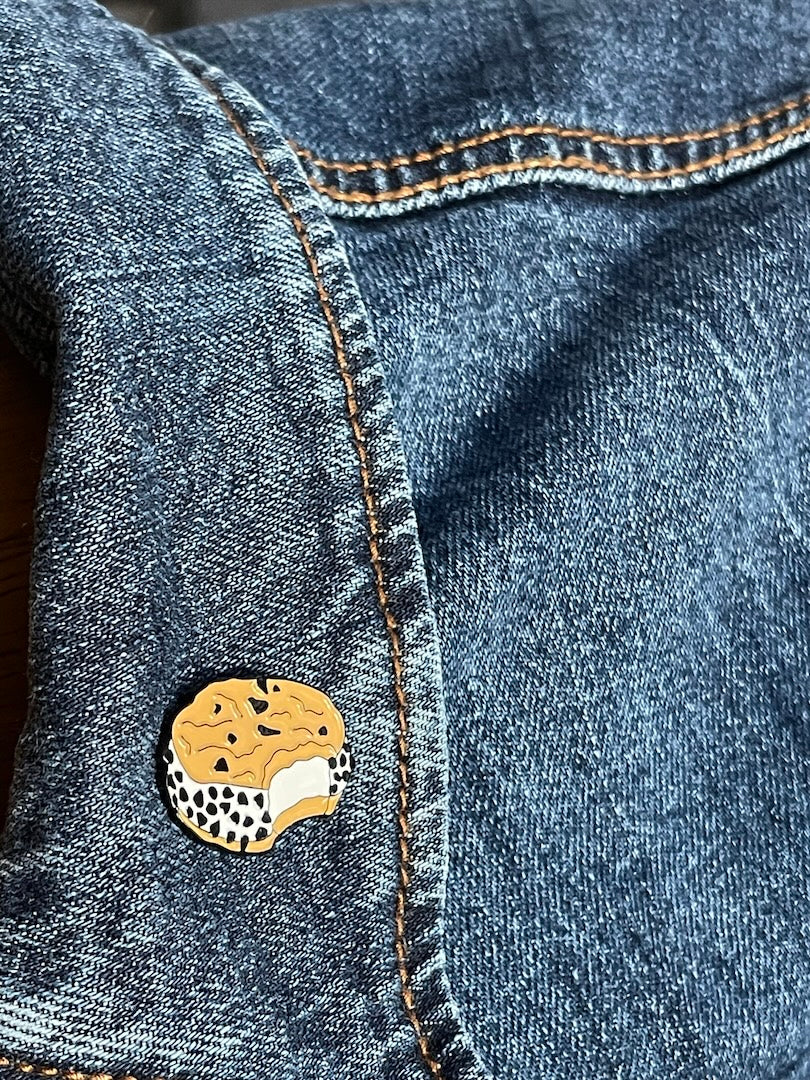 Chocolate Chip Ice Cream Sandwich Enamel Pin on a jean jacket