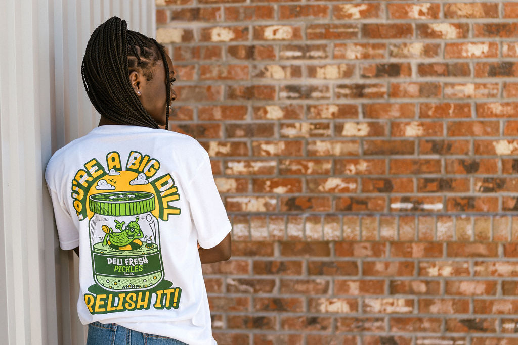 Girl showing back of You're a Big Dill T-shirt
