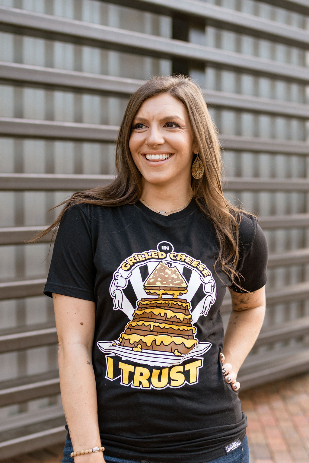 Girl smiling wearing In Grilled Cheese I Trust T-shirt