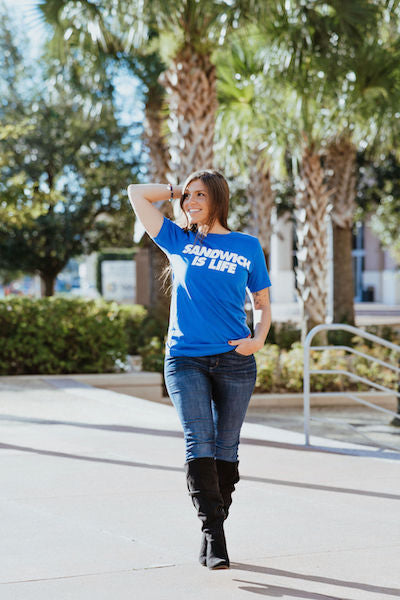 girl wearing a Sandwich is Life t-shirt outside