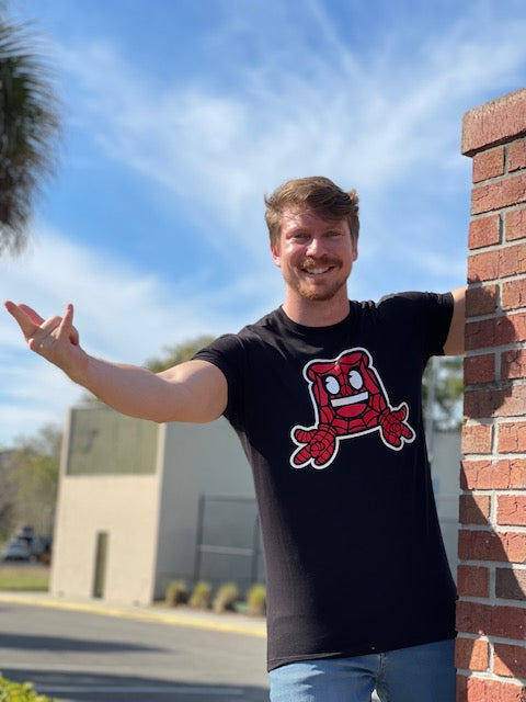 Guy wearing a Spider Bread T-shirt posing 