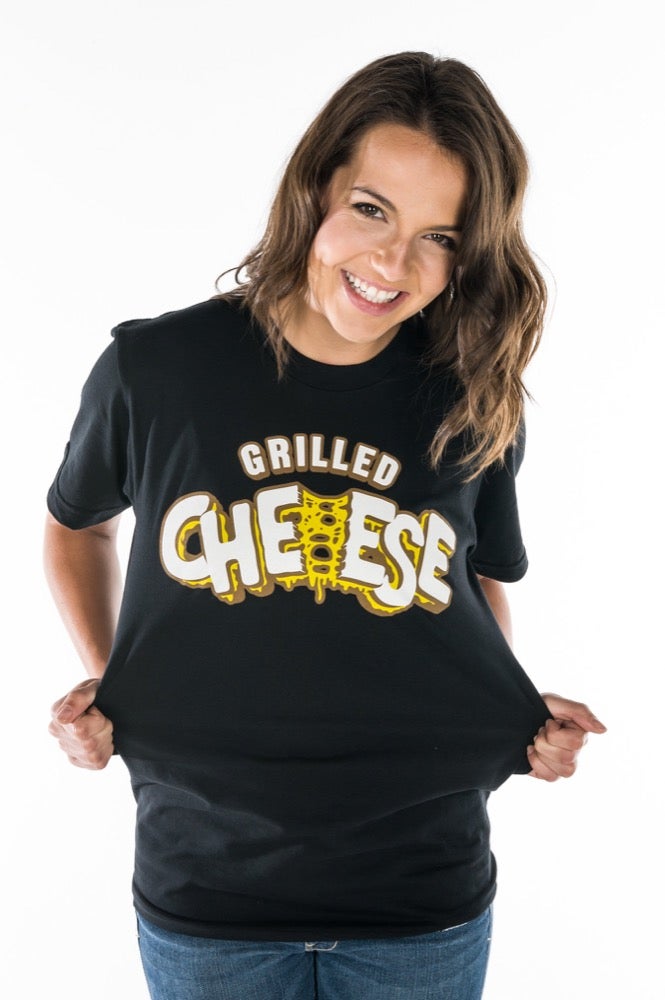 Girl wearing a black Grilled Cheese T-shirt