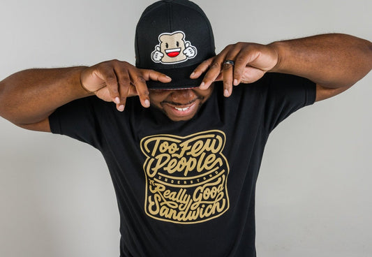 Guy wearing a Biggie Bread Hat and wearing a Sandwich Quote T-shirt