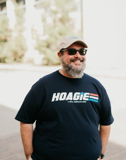 Guy wearing navy blue Hoagie T-shirt