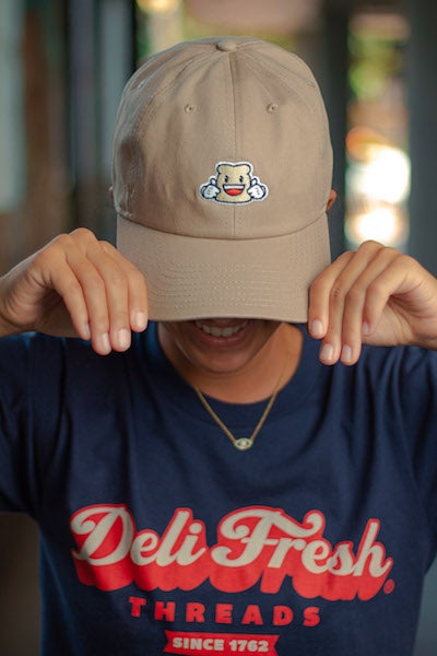 Girl showing off Khaki Relaxed fit Biggie Bread hat