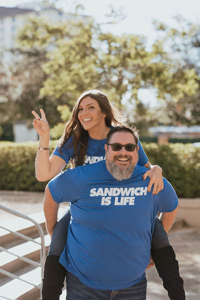 Guy and girl wearing a Sandwich is Life T-shirt