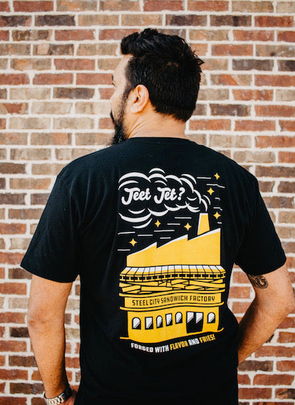 Guy showing the back of the Pittsburgh Steel City Sandwich Factory- Jeet Jet?