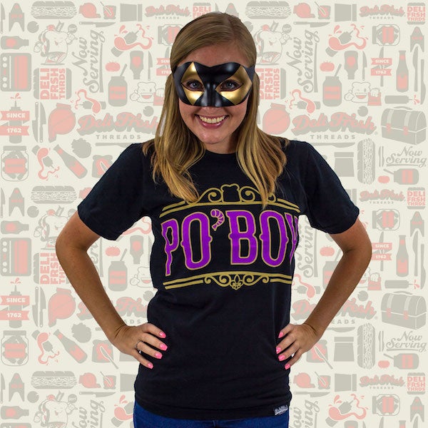 Girl wearing a NOLA mardi gras mask wearing a Louisiana Po'Boy T-shirt